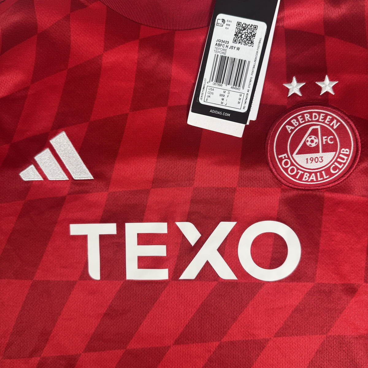 Close-up of Aberdeen 2024/2025 home football shirt, size Medium