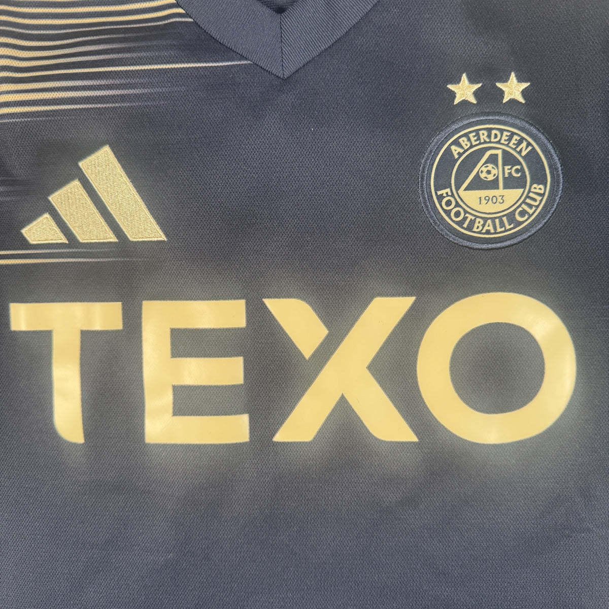 Close-up of Aberdeen 2025/2026 away football shirt, size Small