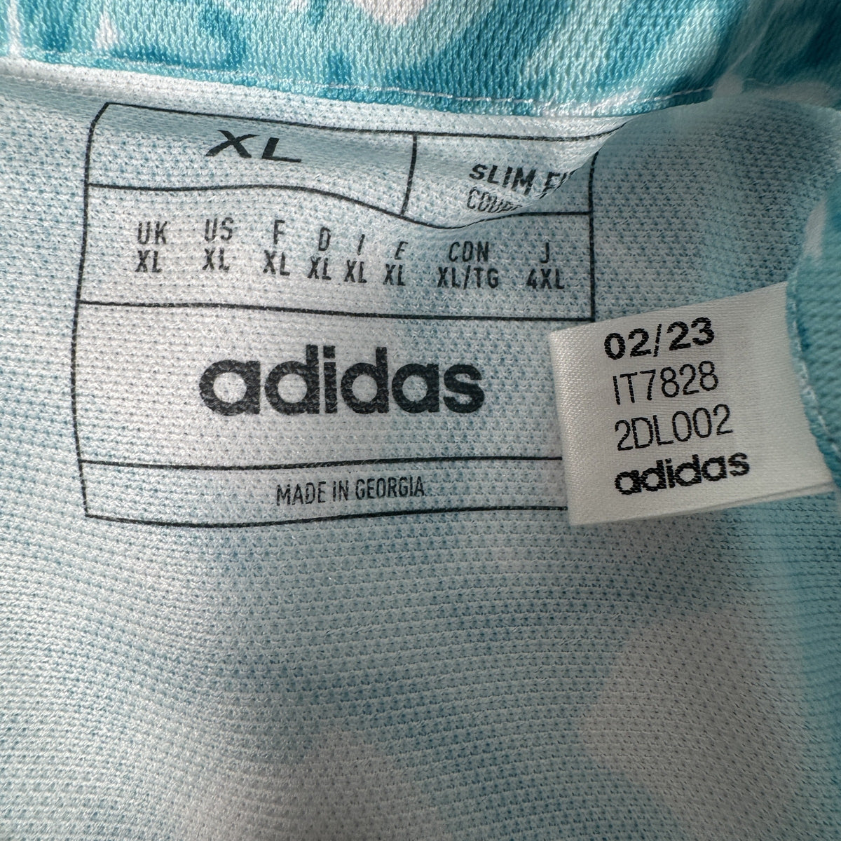 Size label inside Ajax 2023/2024 training football shirt, size XL