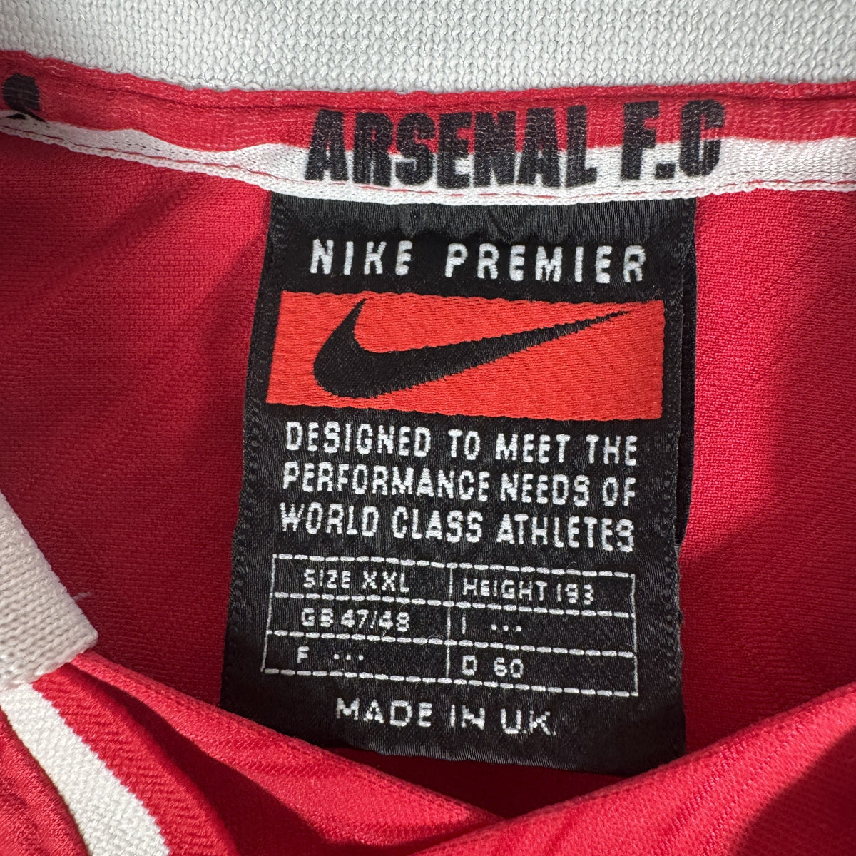 Size label inside Arsenal 1996/1997/1998 home football shirt, size XXL