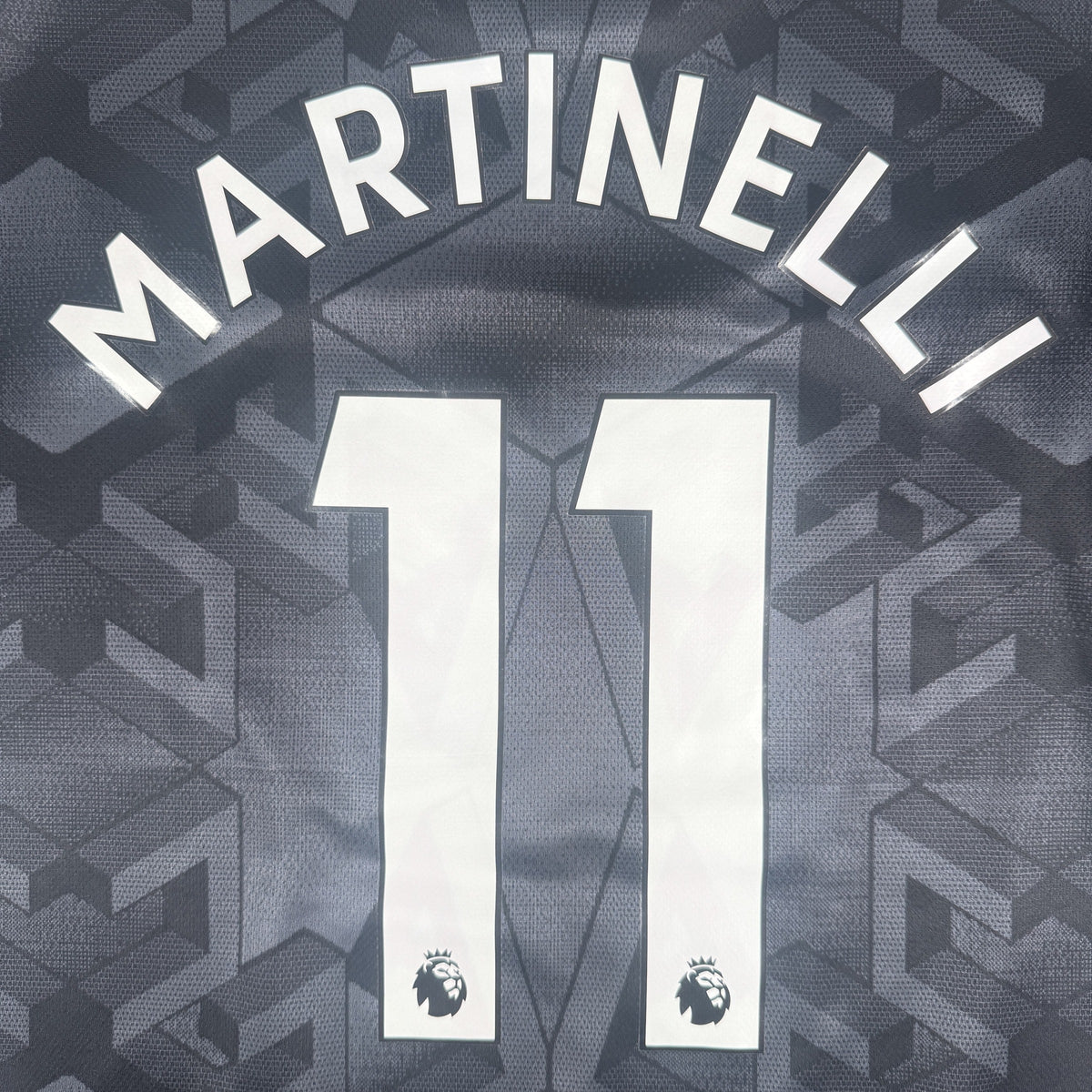 Close-up of Martinelli 11 on Arsenal 2022/2023 away football shirt, size Large