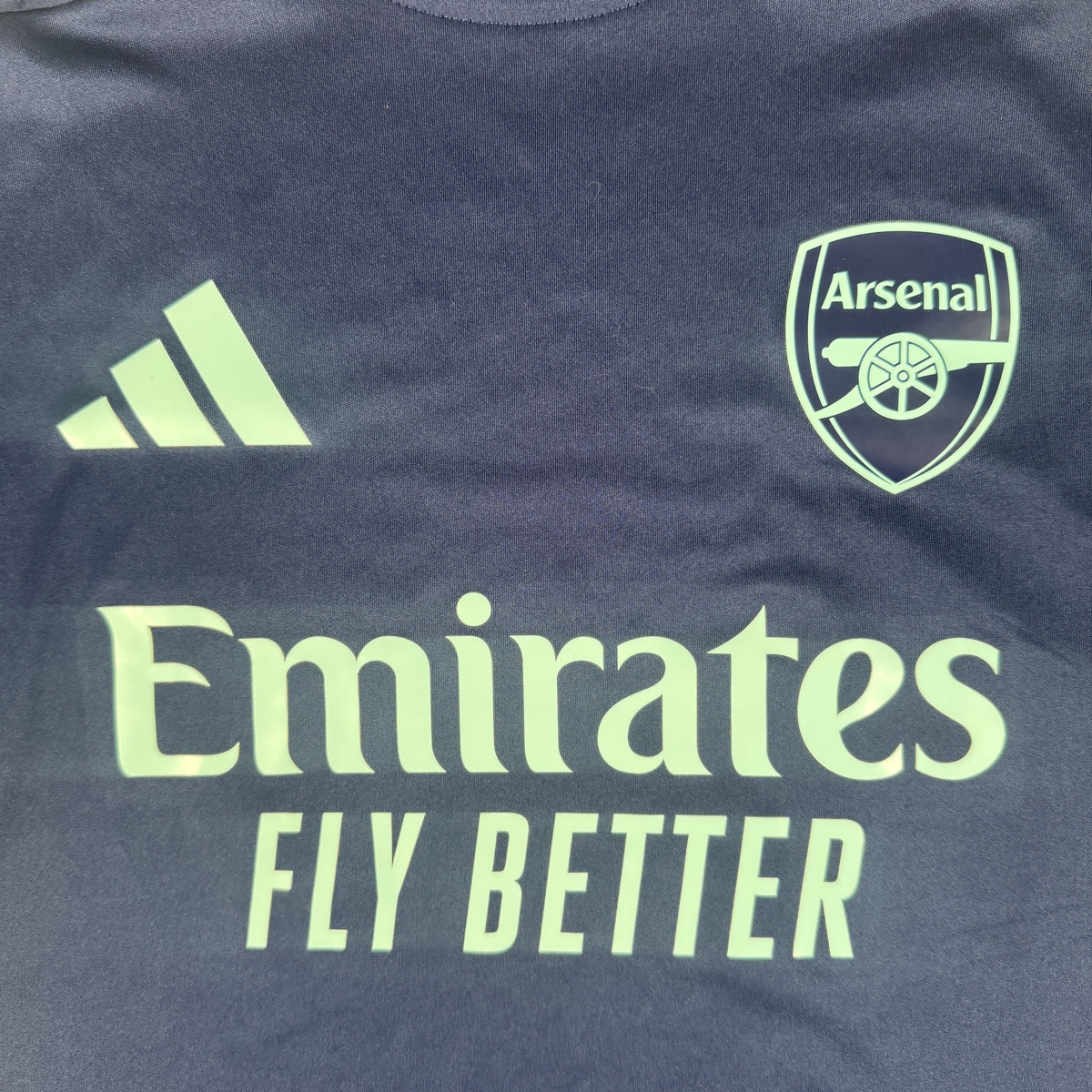 Close-up of Arsenal 2024/2025 training football shirt, size Medium