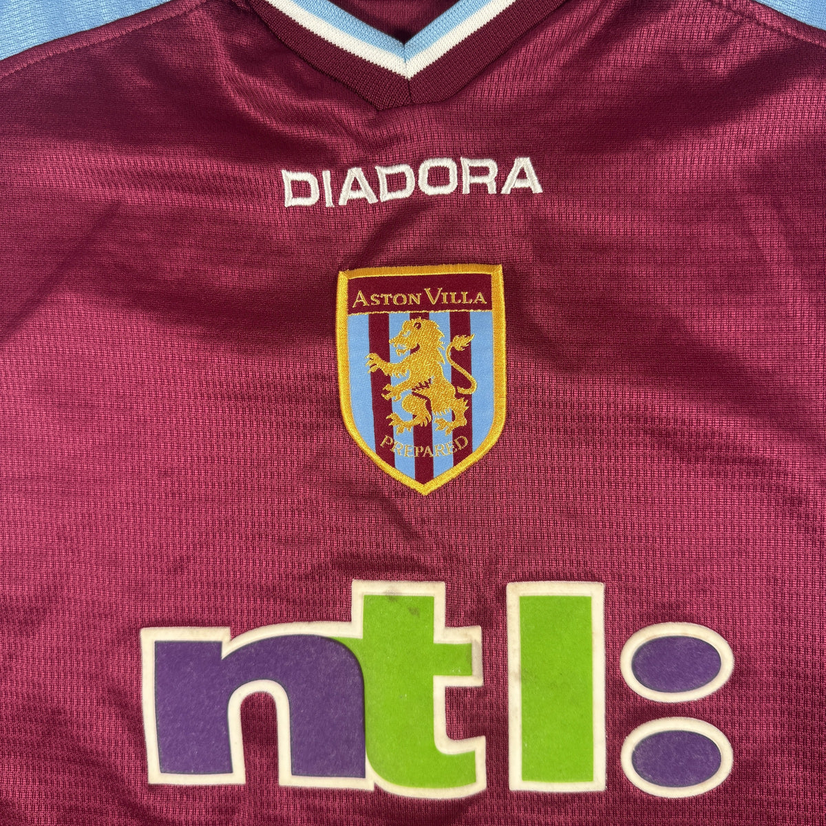 Close-up of Aston Villa 2000/2001 home football shirt, size XL