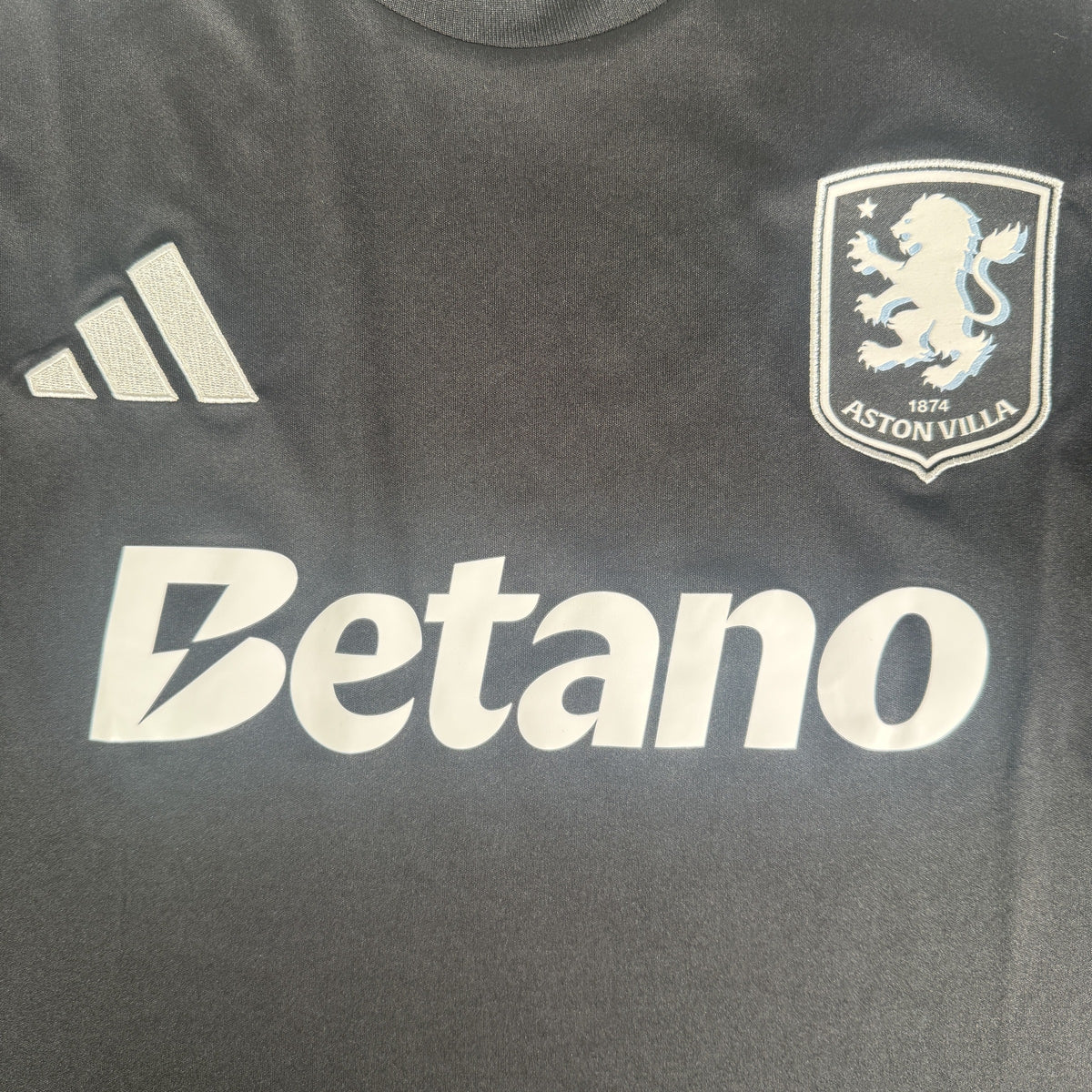 Close-up of Aston Villa 2025/2026 away football shirt, size 3XL