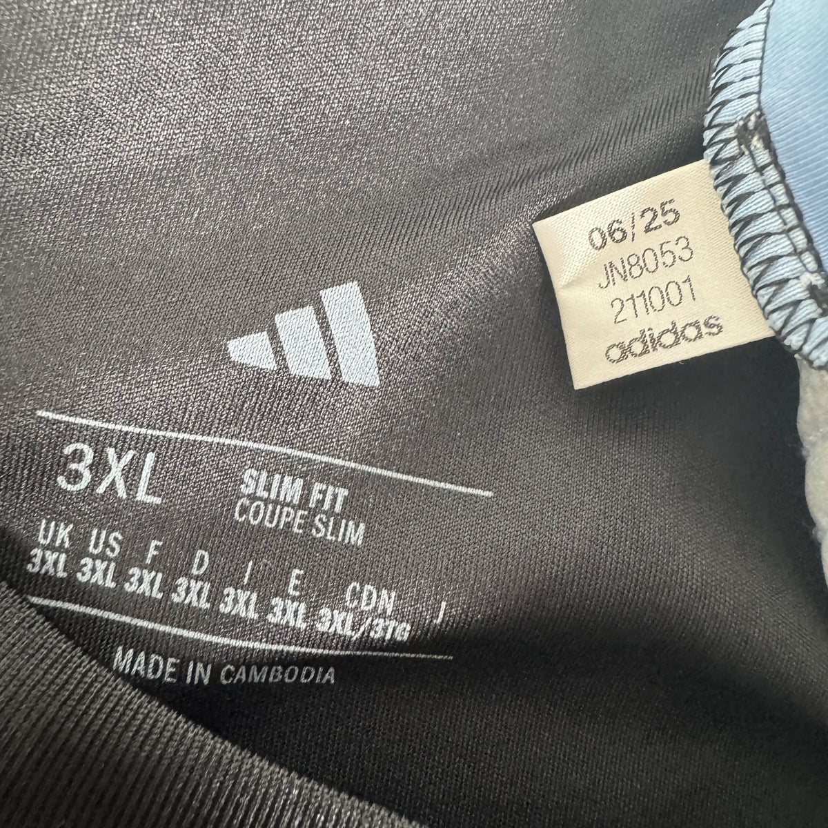 Size label inside Aston Villa 2025/2026 away football shirt, size 3XL