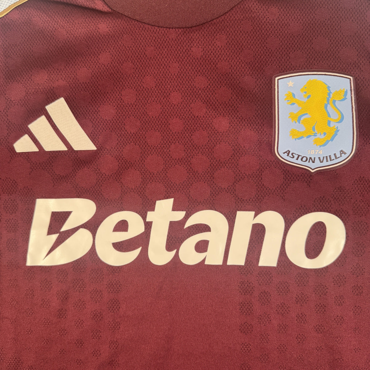 Close-up of Aston Villa 2025/2026 home football shirt, size XXL