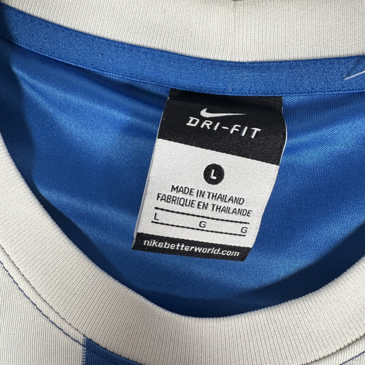 Size label inside Brighton & Hove Albion 2014/2015 home football shirt, size Large