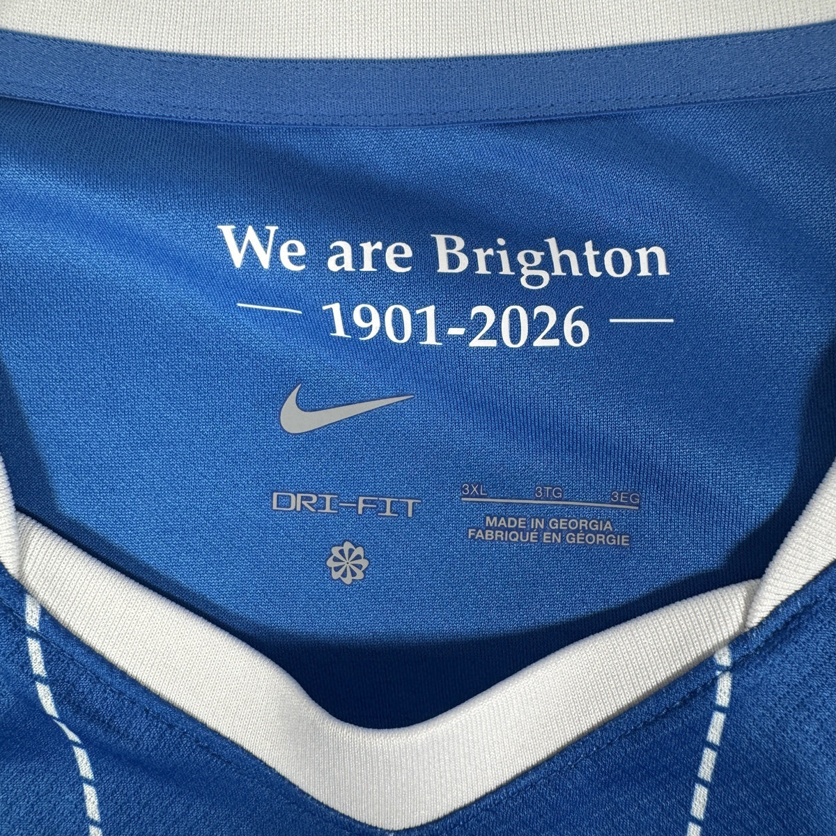 Size label inside Brighton & Hove Albion 2026/2027 home football shirt, size 3XL