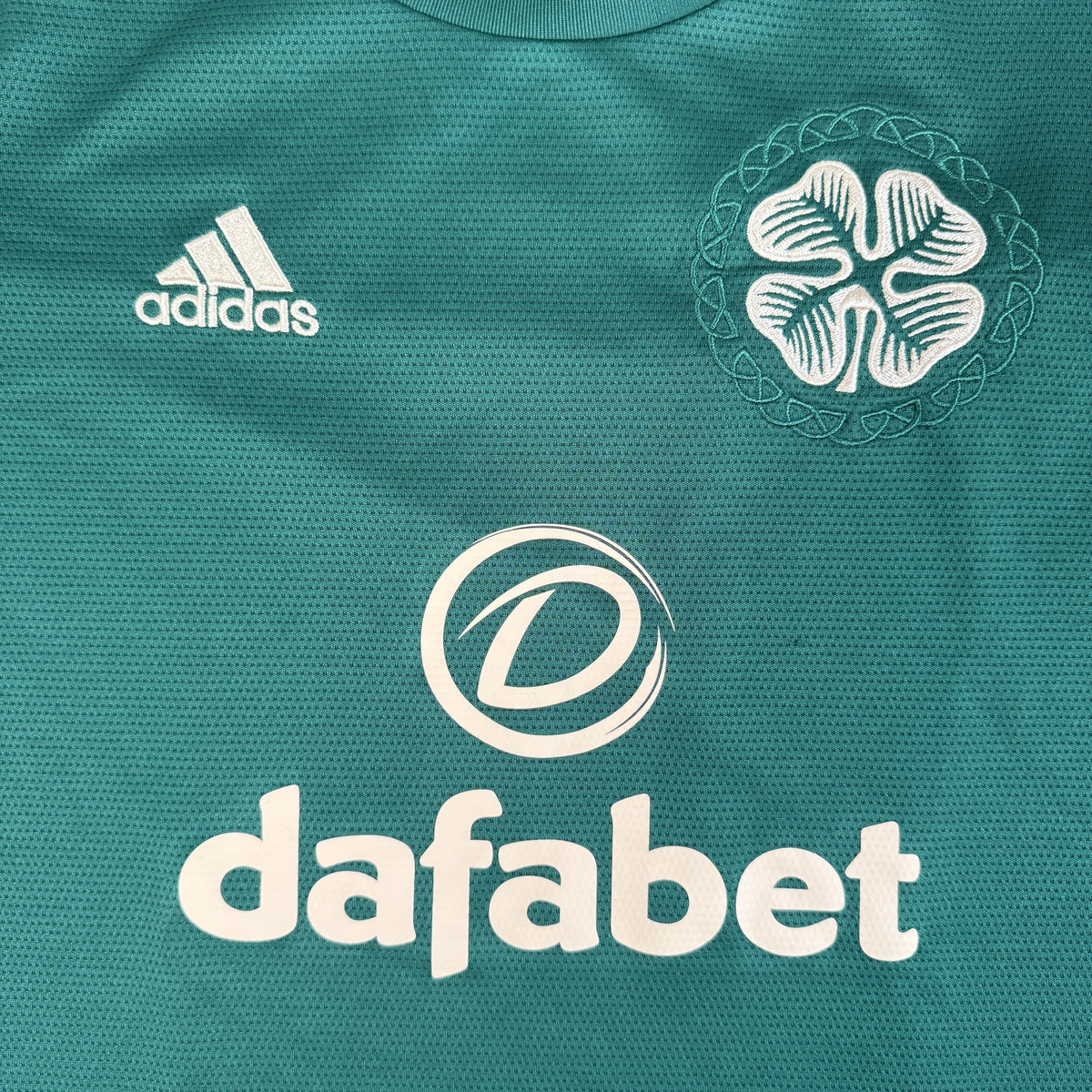 Close-up of Celtic 2021/2022 away football shirt, size Small