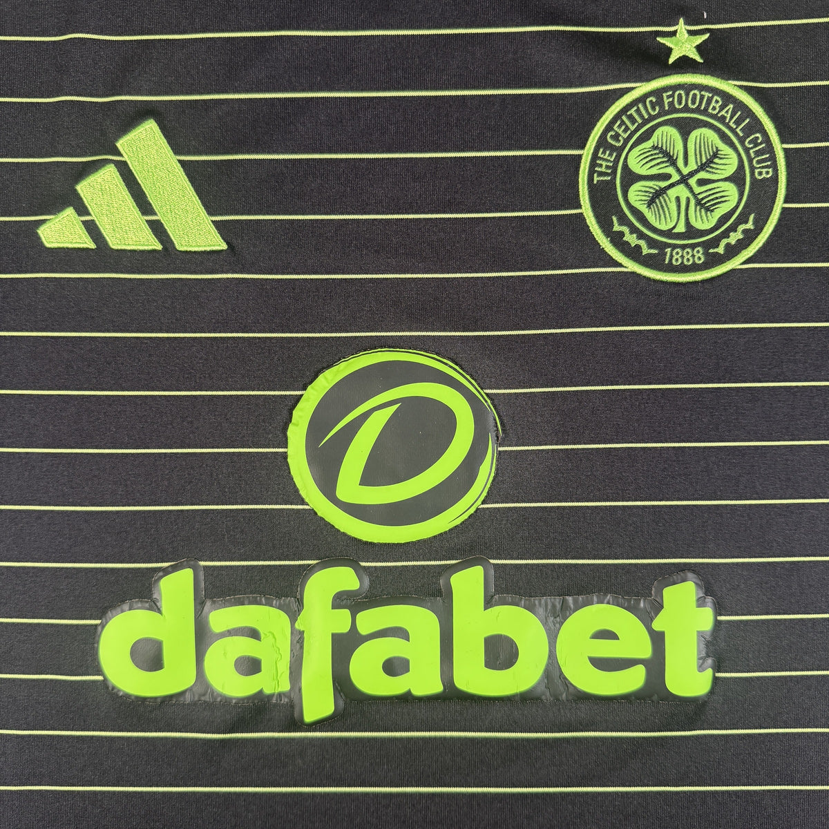 Close-up of Celtic 2025/2026 away football shirt, size Medium