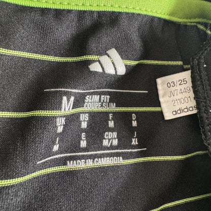 Size label inside Celtic 2025/2026 away football shirt, size Medium