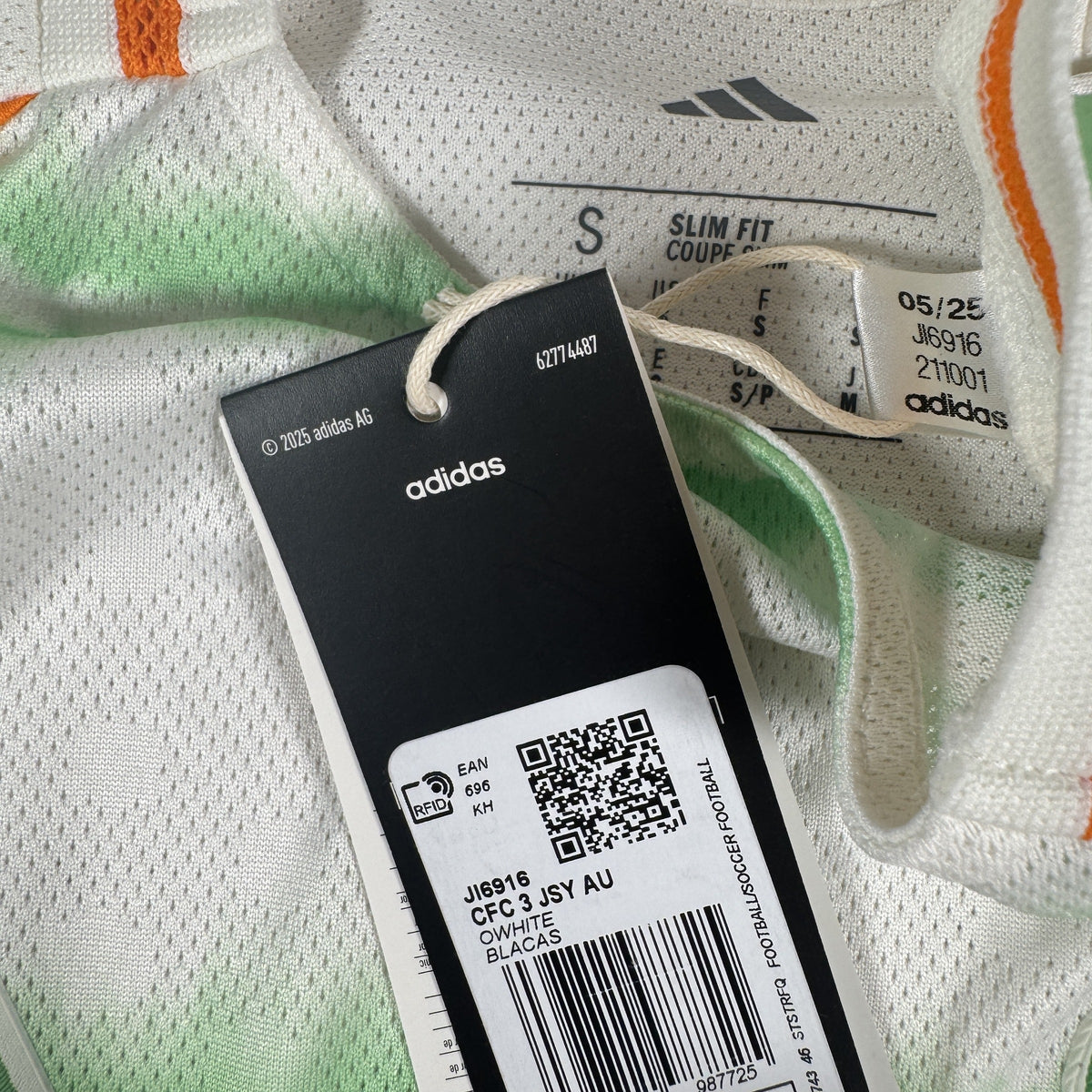 Size label inside Celtic 2025/2026 third football shirt, size Small