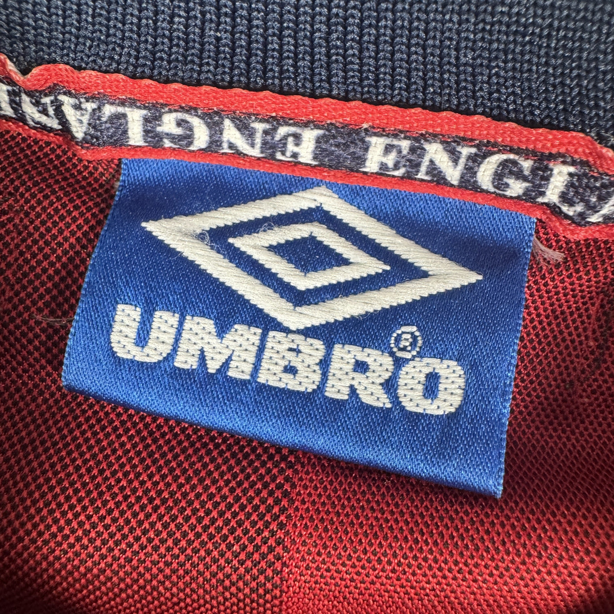 Size label inside England 1998/1999/2000 away football shirt, size Medium
