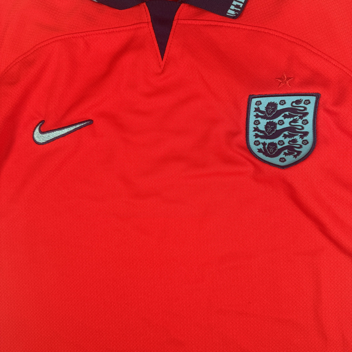 Close-up of England 2022/2023/2024 away football shirt, size Large