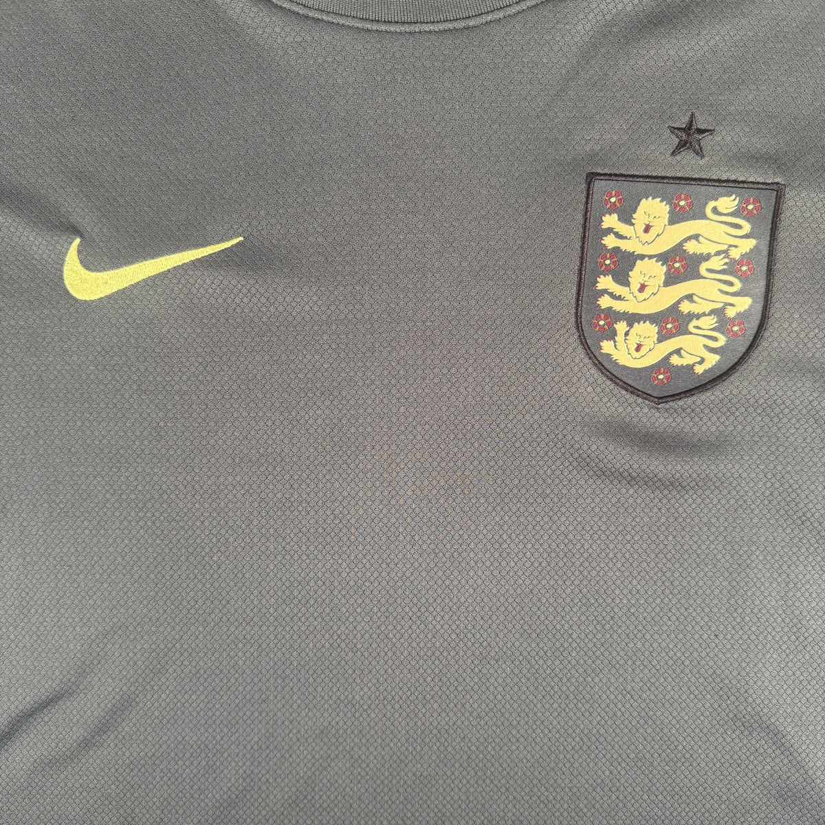 Close-up of England 2024/2025/2026 away football shirt, size Large