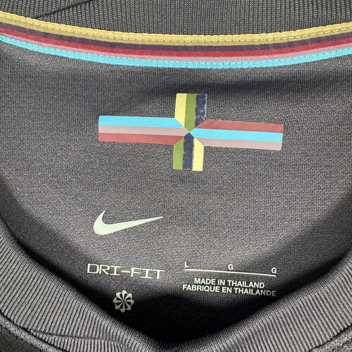 Size label inside England 2024/2025/2026 away football shirt, size Large