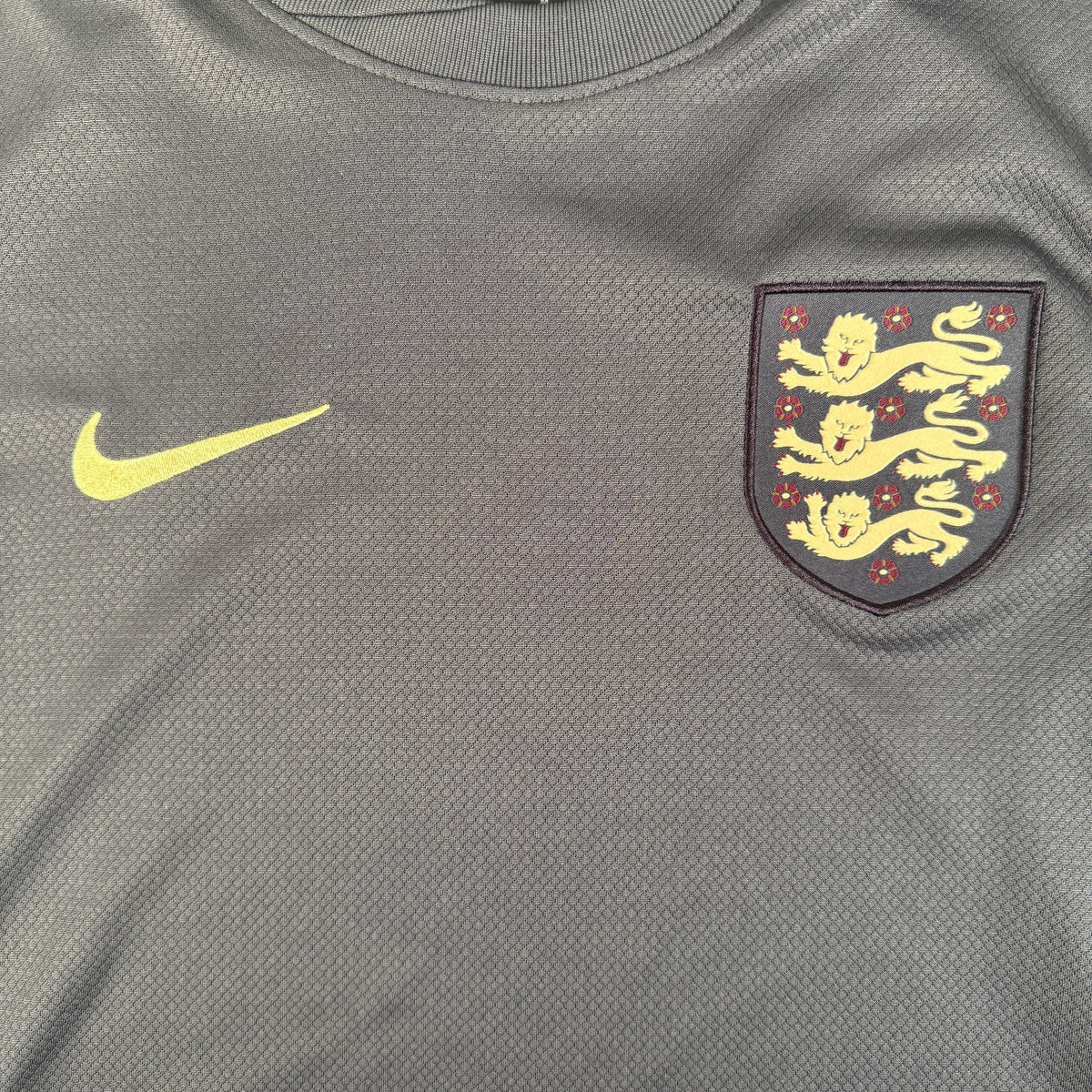 Close-up of England 2024/2025/2026 away football shirt, size Medium