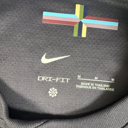 Size label inside England 2024/2025/2026 away football shirt, size Medium