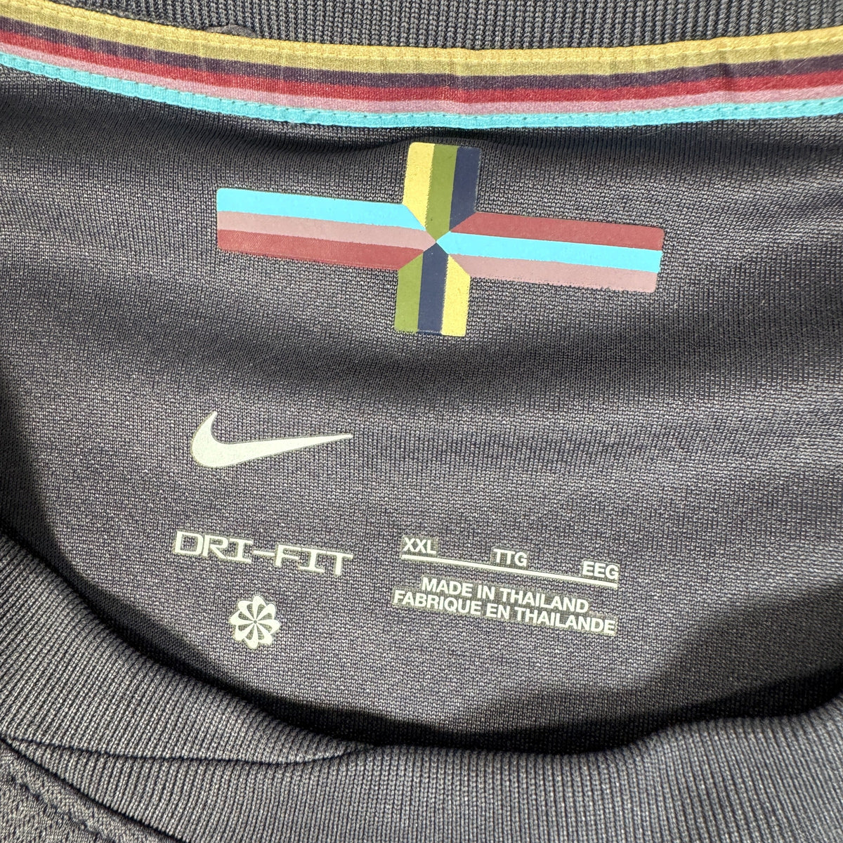Size label inside England 2024/2025/2026 away football shirt, size XXL