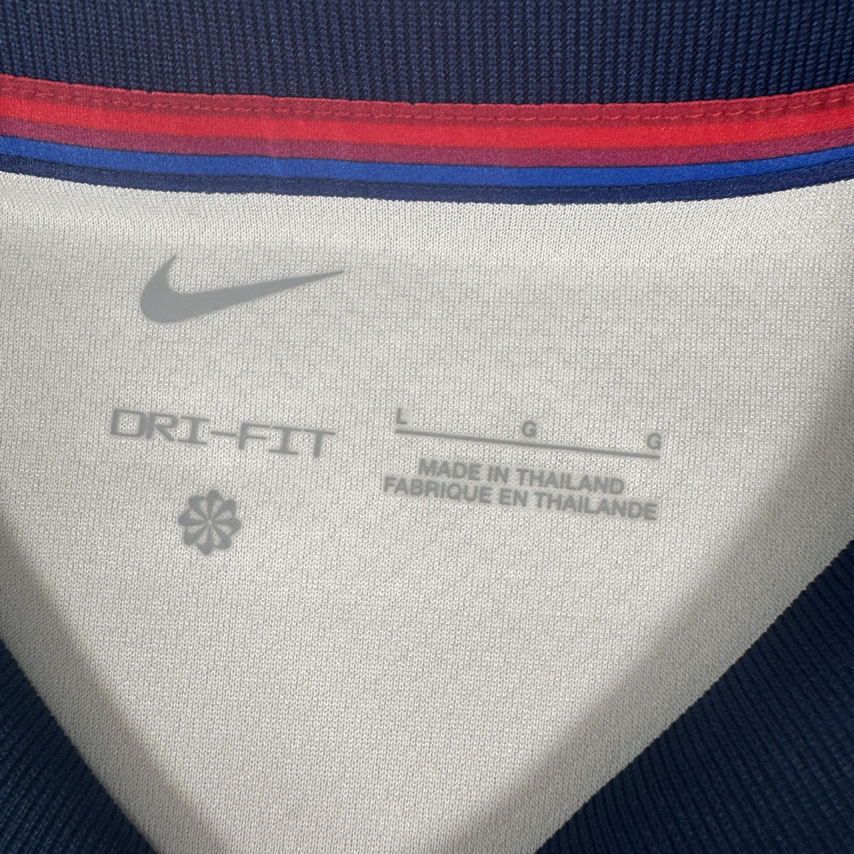 Size label inside England 2024/2025/2026 home football shirt, size Large