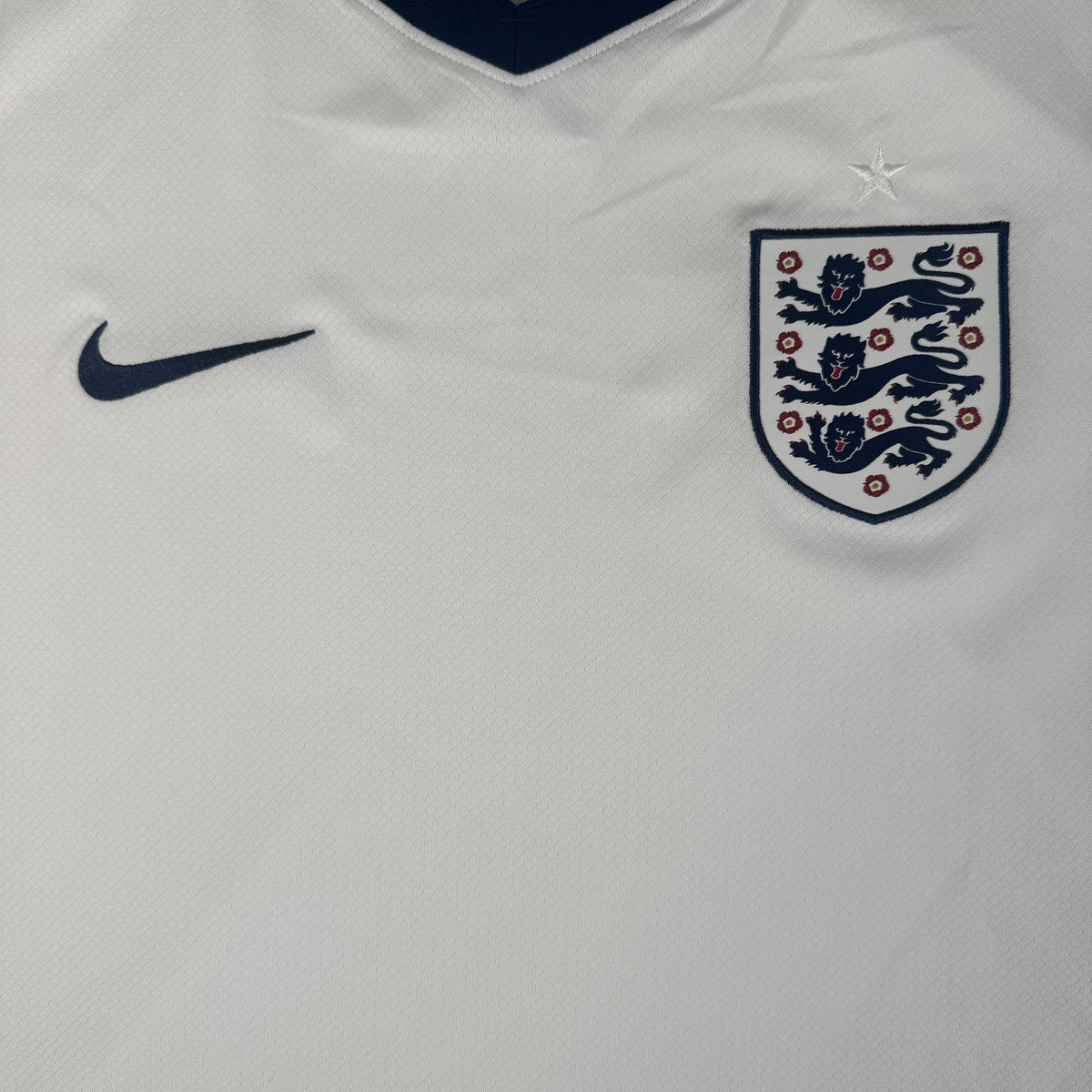 Close-up of England 2024/2025/2026 home football shirt, size XL