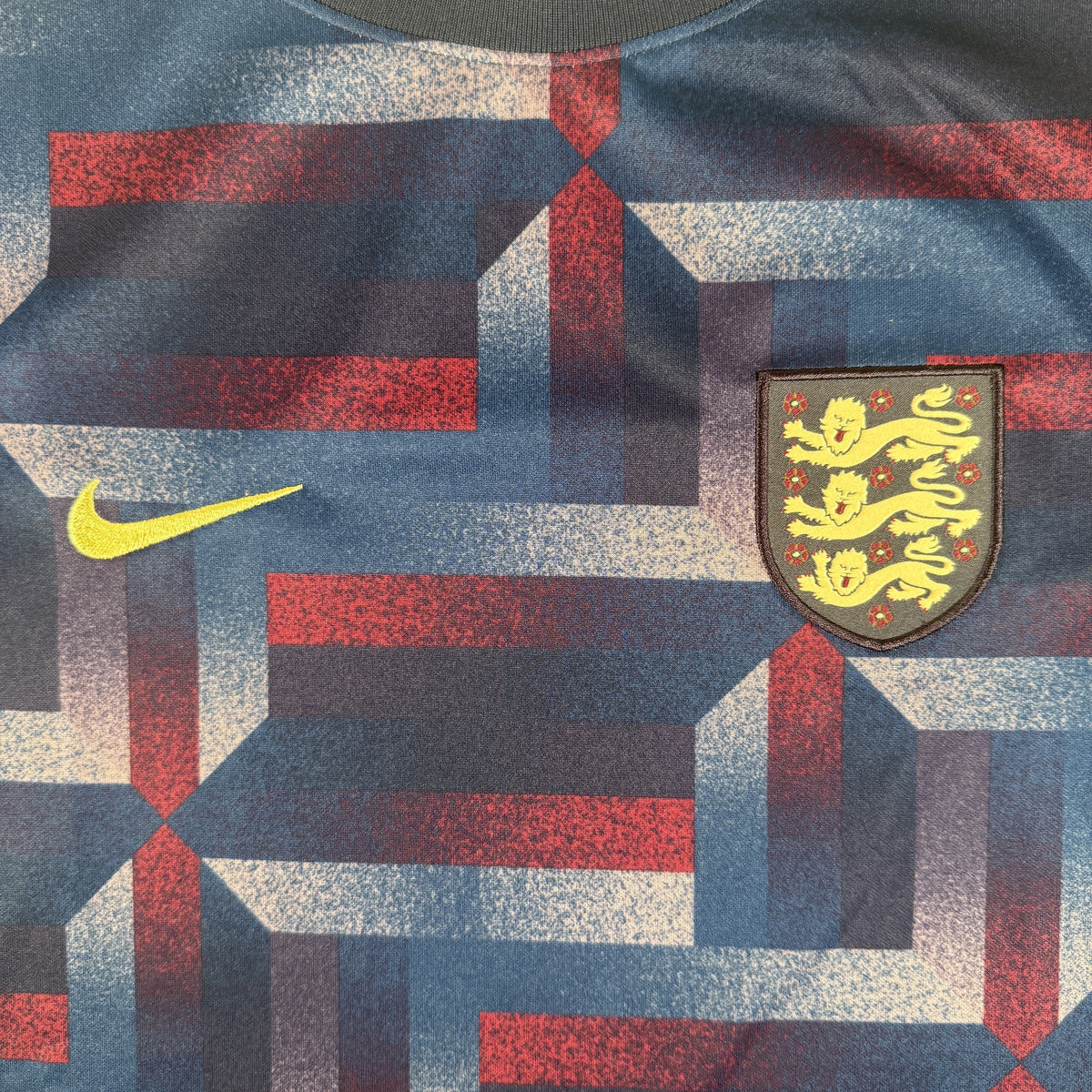 Close-up of England 2024/2025/2026 training football shirt, size Medium