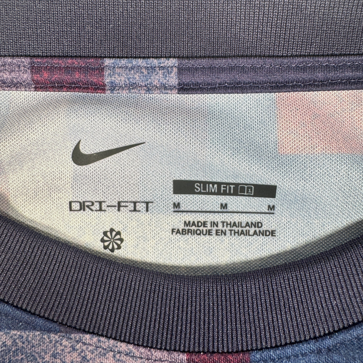 Size label inside England 2024/2025/2026 training football shirt, size Medium