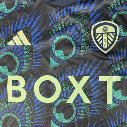 Close-up of Leeds United 2023/2024 away football shirt, size Medium