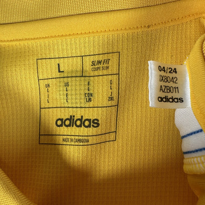 Size label inside Leeds United 2024/2025 away football shirt, size Large