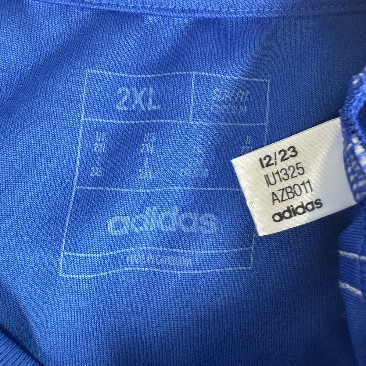 Size label inside Leicester City 2024/2025 home football shirt, size XXL