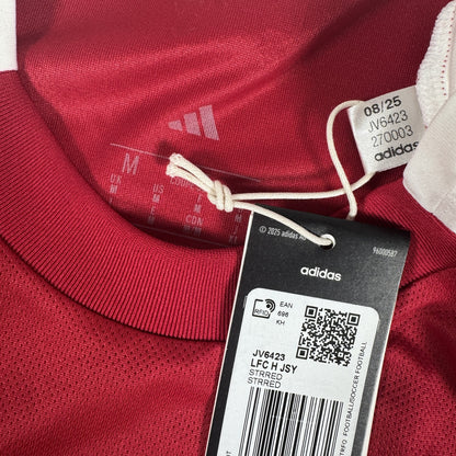 Size label inside Liverpool 2025/2026 home football shirt, size Medium