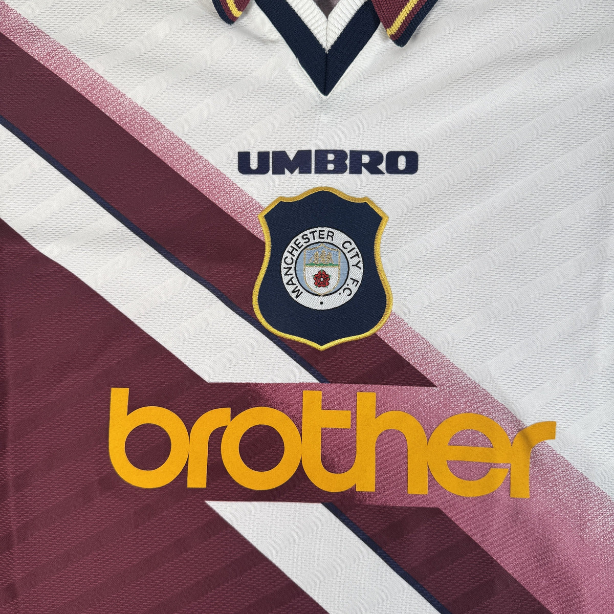 Close-up of Manchester City 1996/1997 away football shirt, size XXL