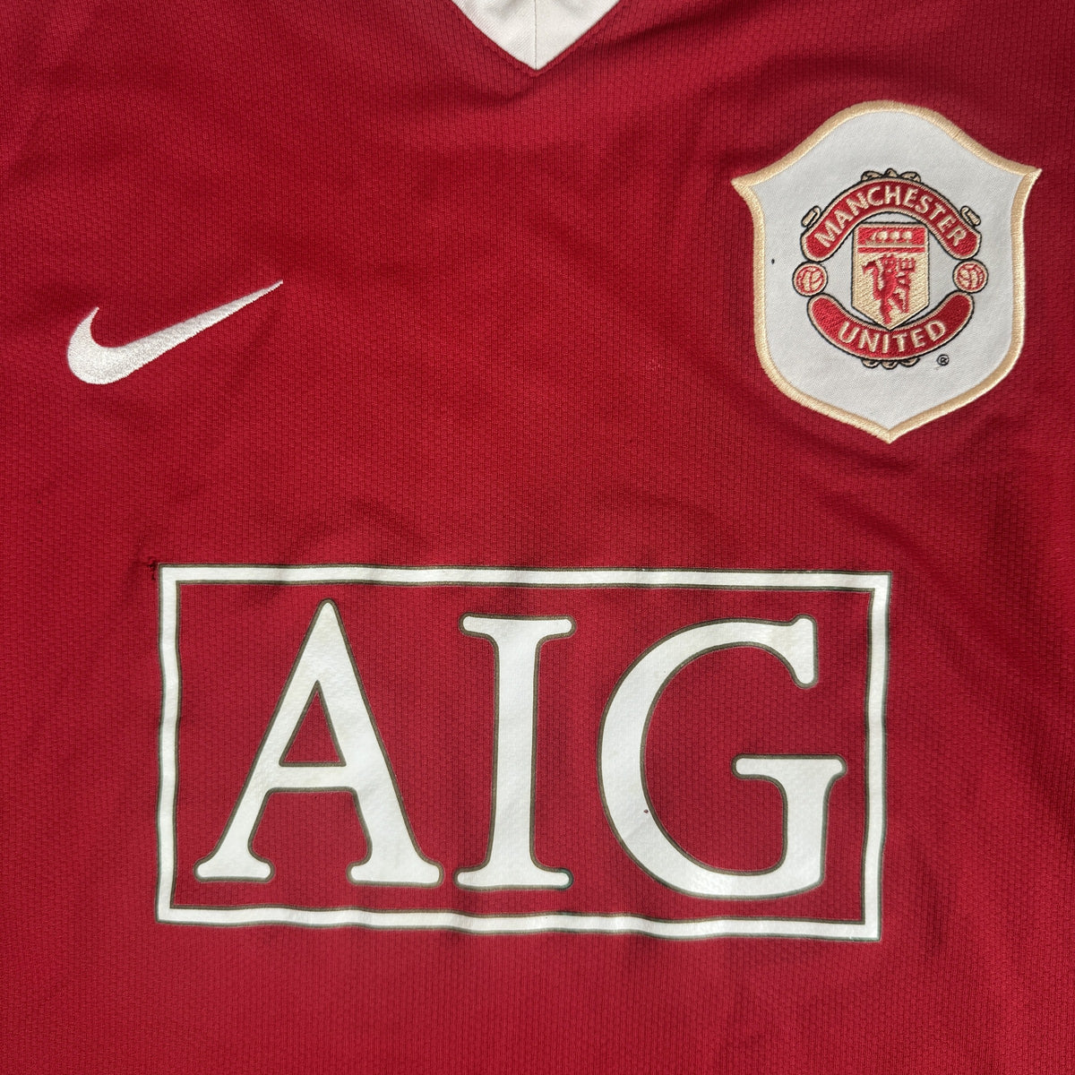 Close-up of Manchester United 2006/2007 home football shirt, size Large
