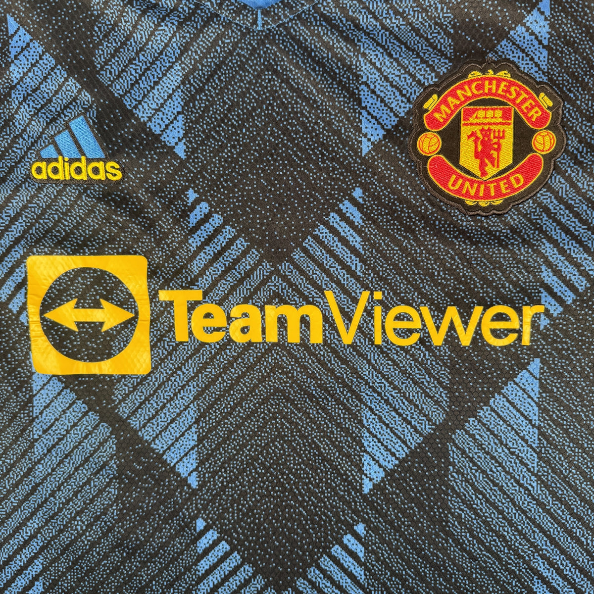 Close-up of Manchester United 2021/2022 third football shirt, size XXL