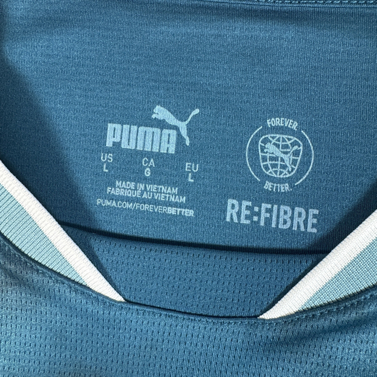 Size label inside Marseille 2024/2025 away football shirt, size Large