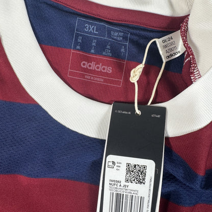 Size label inside Newcastle United 2024/2025 away football shirt, size 3XL