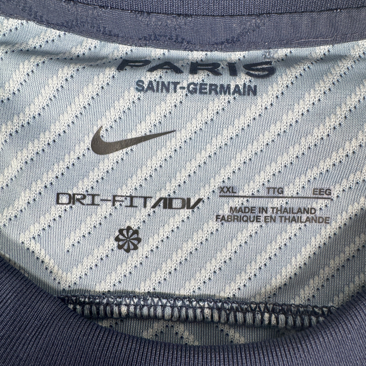 Size label inside Paris Saint-Germain 2022/2023 home football shirt, size XXL