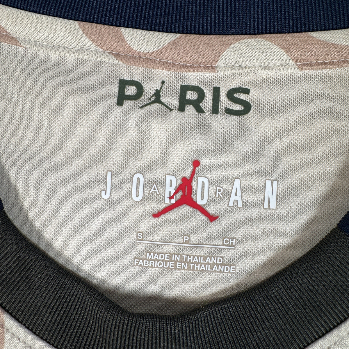 Size label inside Paris Saint-Germain 2023/2024 fourth football shirt, size Small