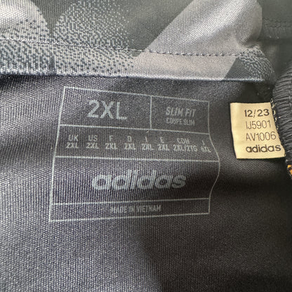 Size label inside Real Madrid 2023/2024 away football shirt, size XXL