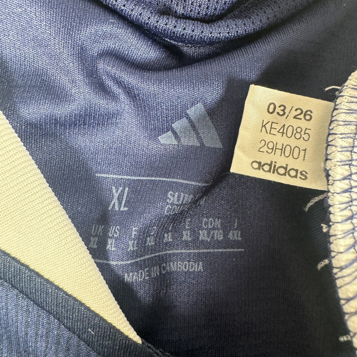 Size label inside Scotland 2026/2027 home football shirt, size XL