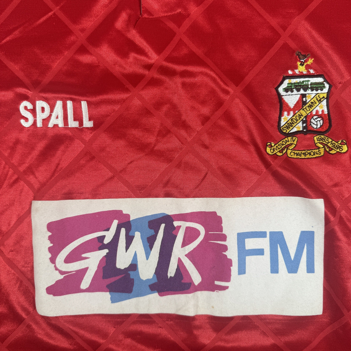 Close-up of Swindon Town 1989/1990/1991 home football shirt, size Medium