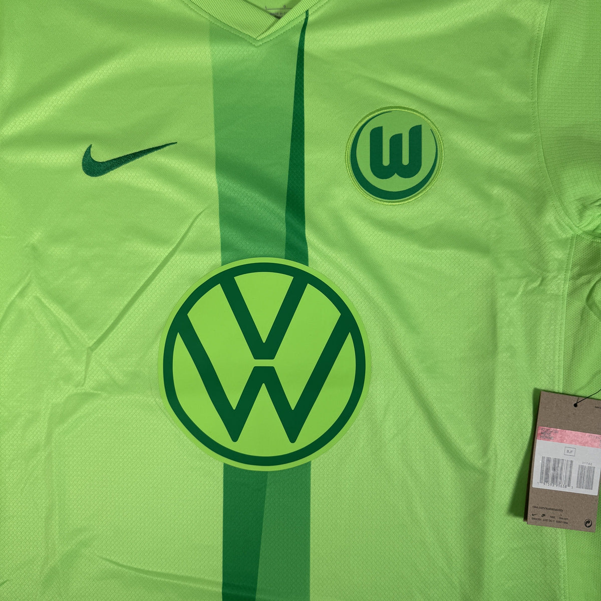 Close-up of VfL Wolfsburg 2024/2025 home football shirt, size Large