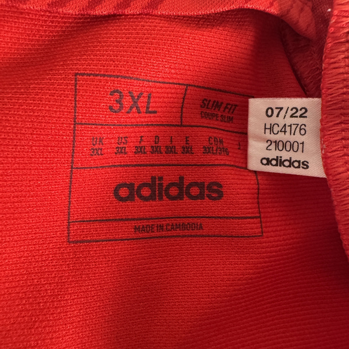 Size label inside Wales 2022/2023/2024 home football shirt, size 3XL
