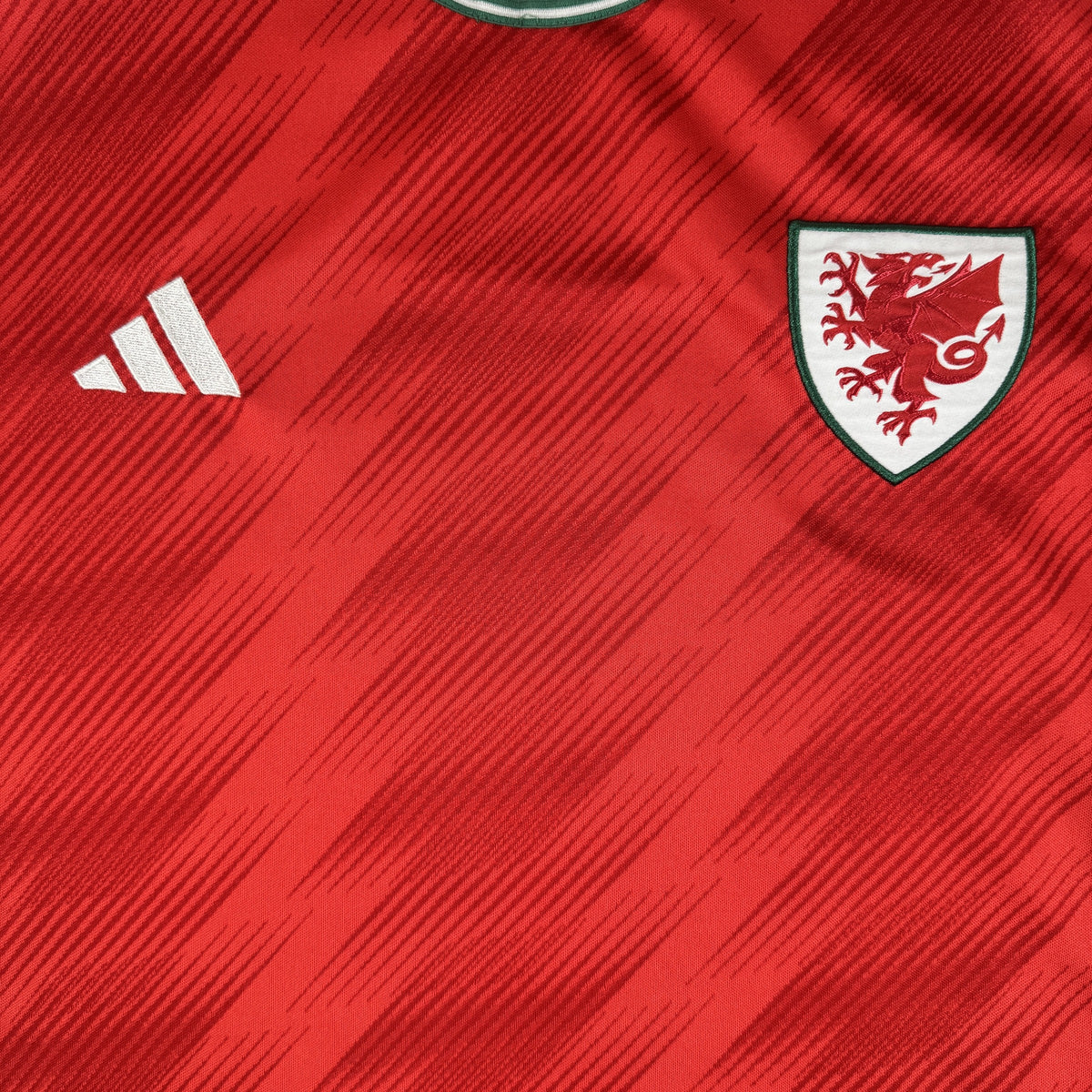 Close-up of Wales 2022/2023/2024 home football shirt, size XL